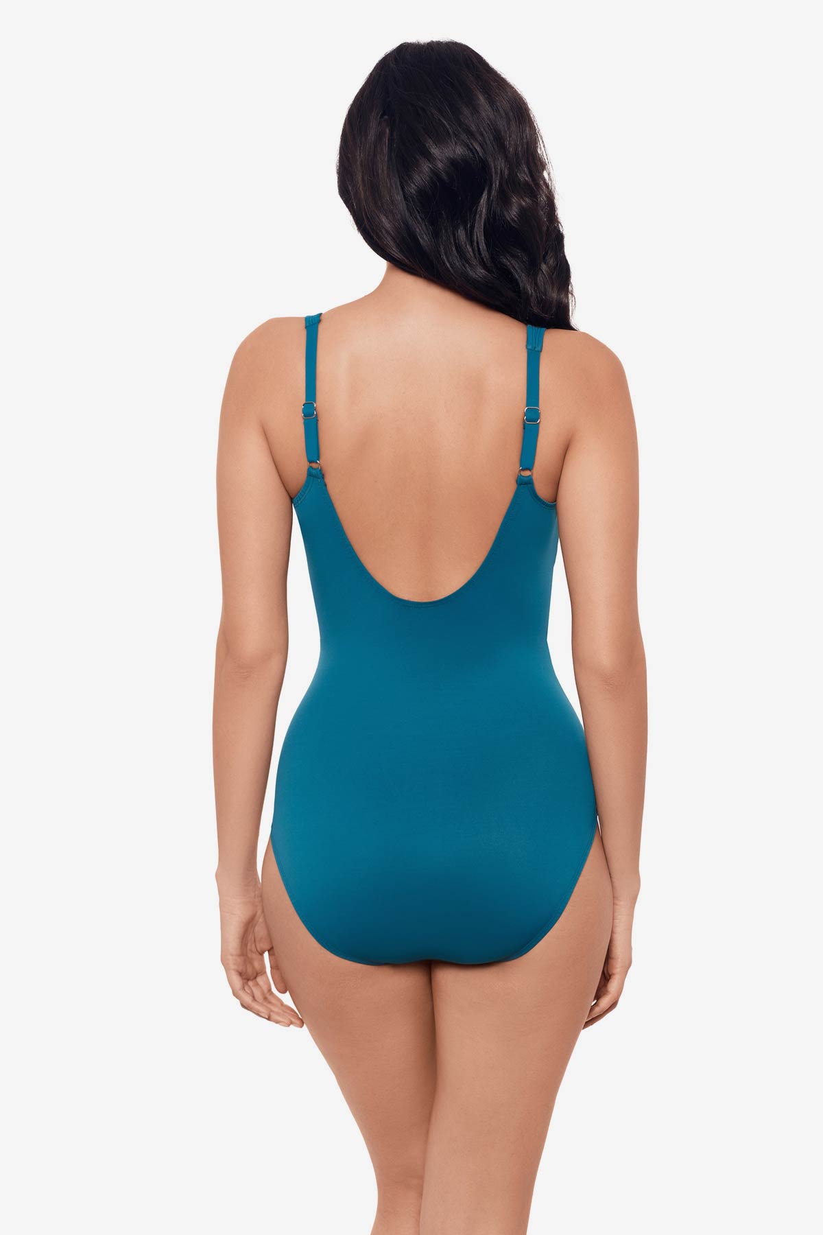 Woman facing away wearing an aegean blue one-piece swimsuit
