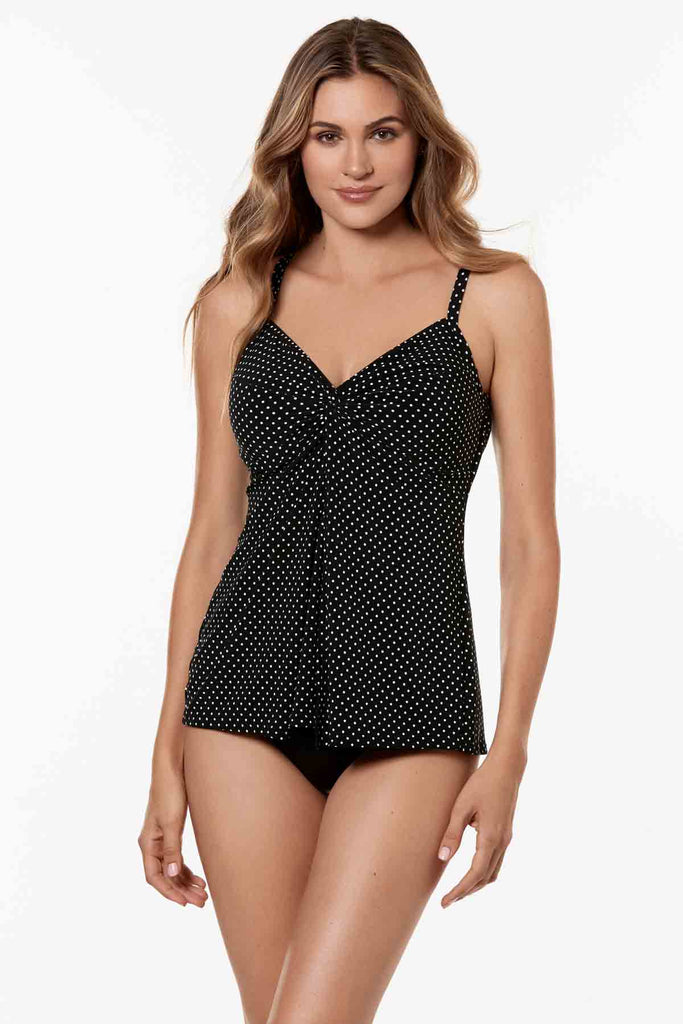 Woman in a miracle suit tankini top.