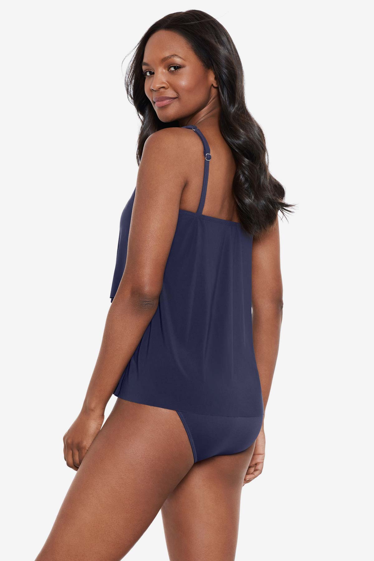 Woman acing left to show detail of the tankini top