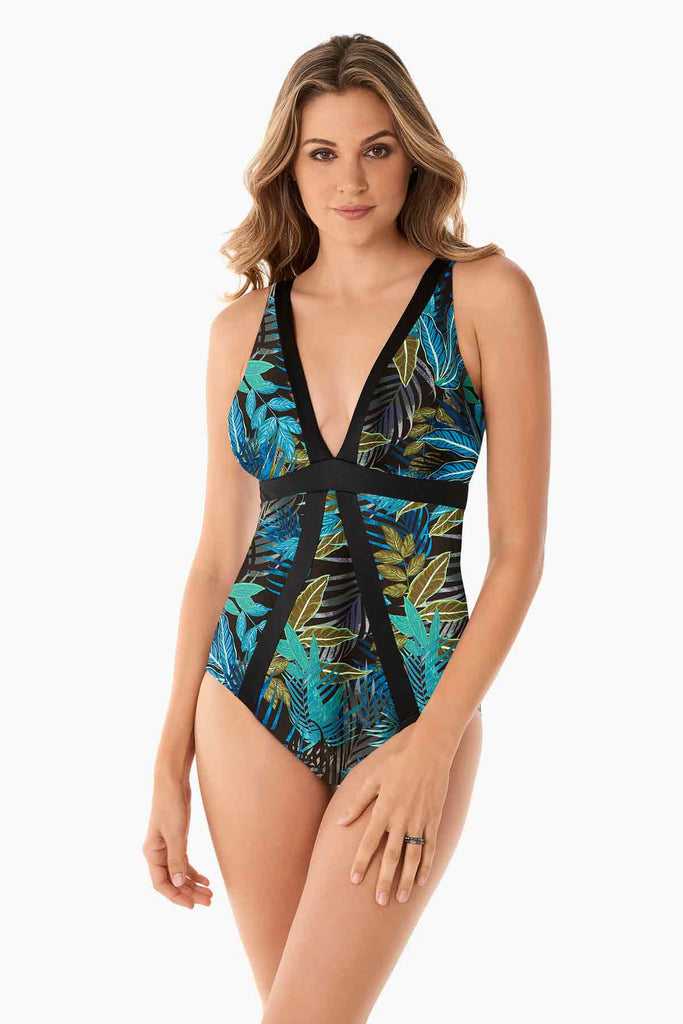 Woman wearing a one piece swim suit.