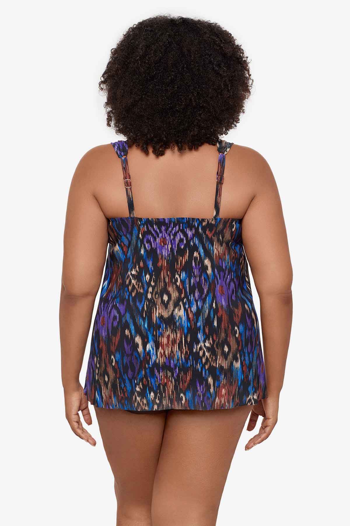 Woman turned away Woman wearing a multicolor tankini top