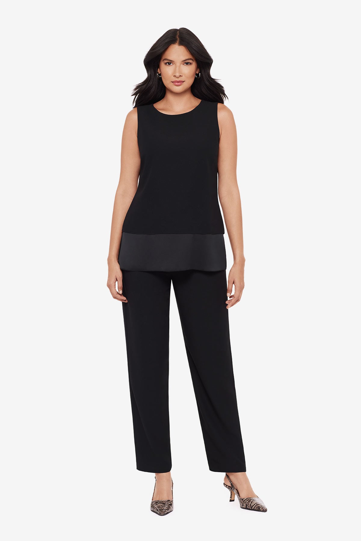 Woman wearing a black tunic blouse with matching jogger pants