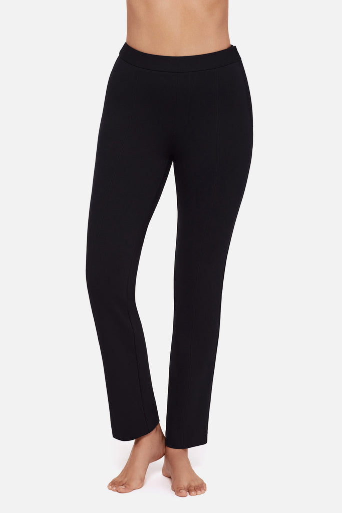 Close up of woman wearing black slim fit pants