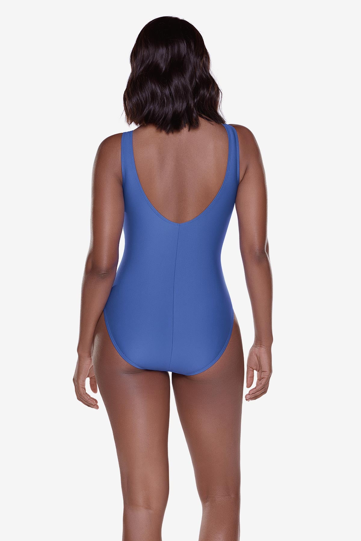 Woman turned away wearing a blue one-piece swimsuit