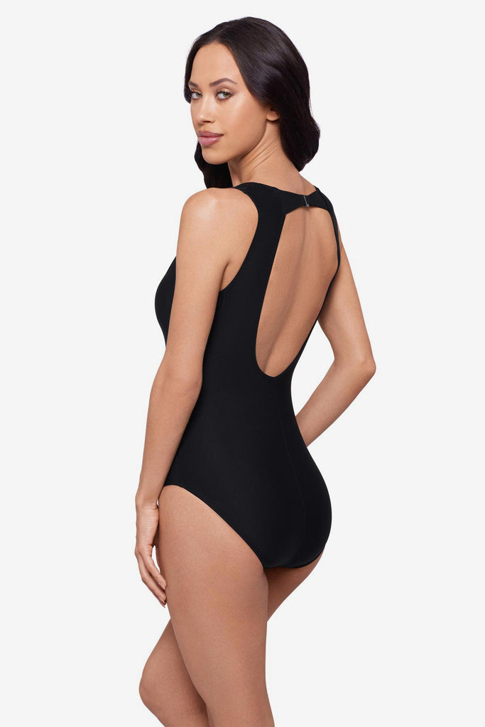 Woman turned right wearing a black one-piece swimsuit 