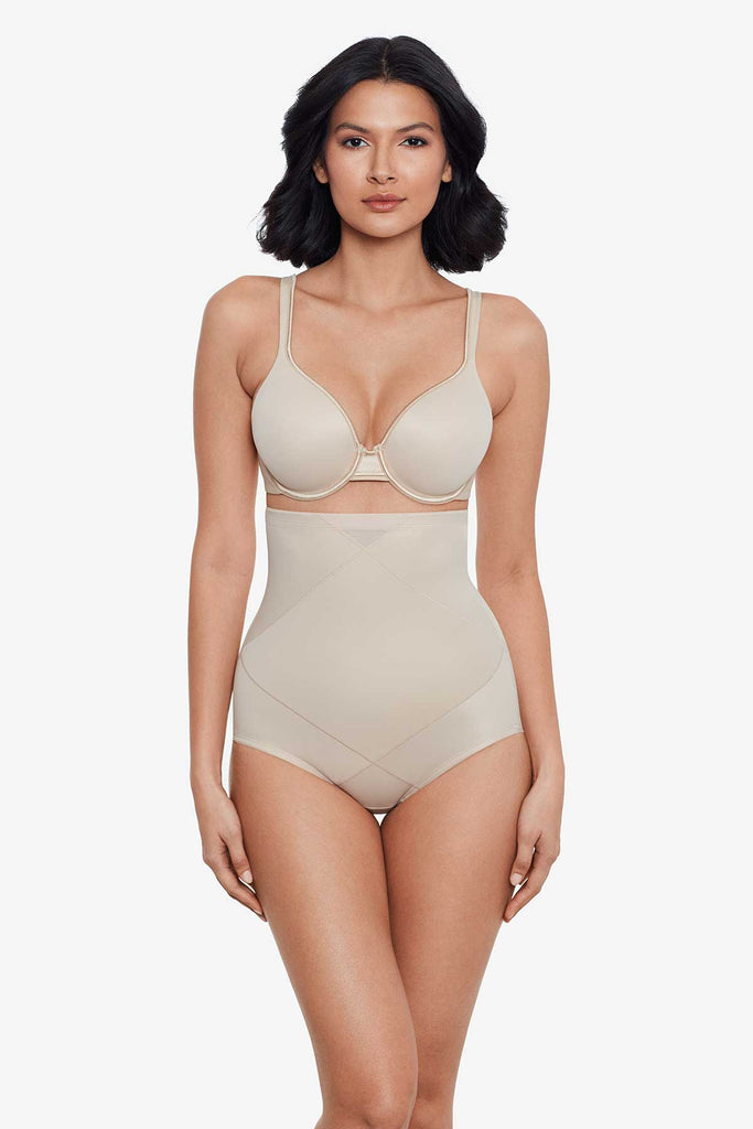 Woman wearing Beige Tummy Tuck High-Waisted Shaping Brief