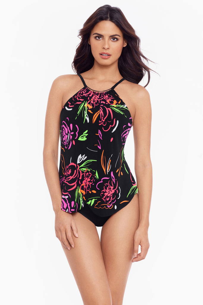 Woman in a vibrant printed swim suit.