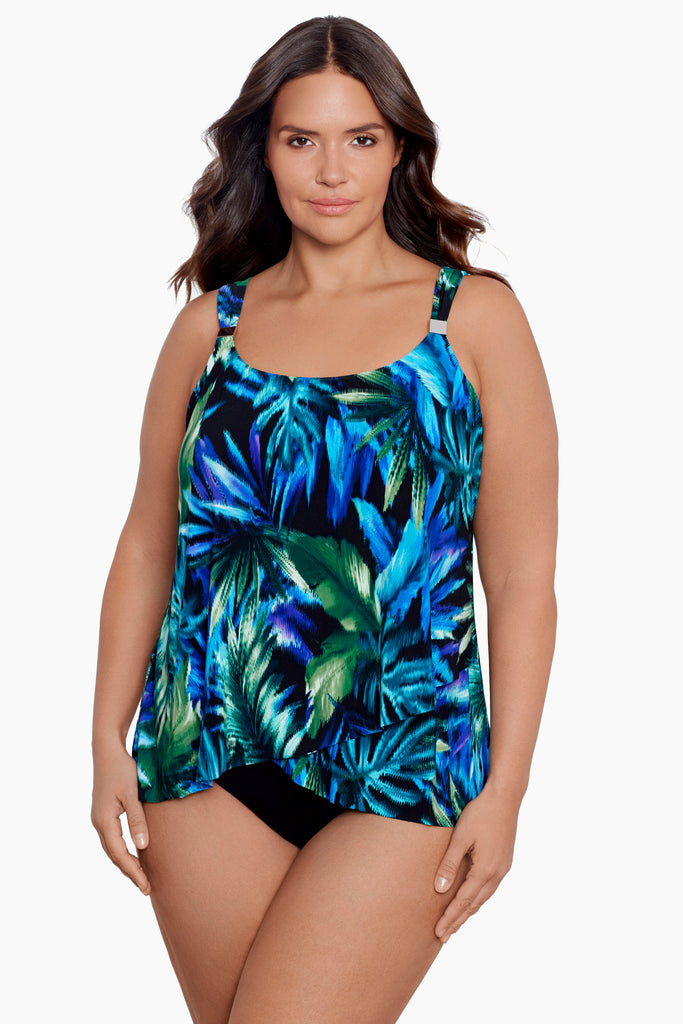 A young woman in a printed tankini top.