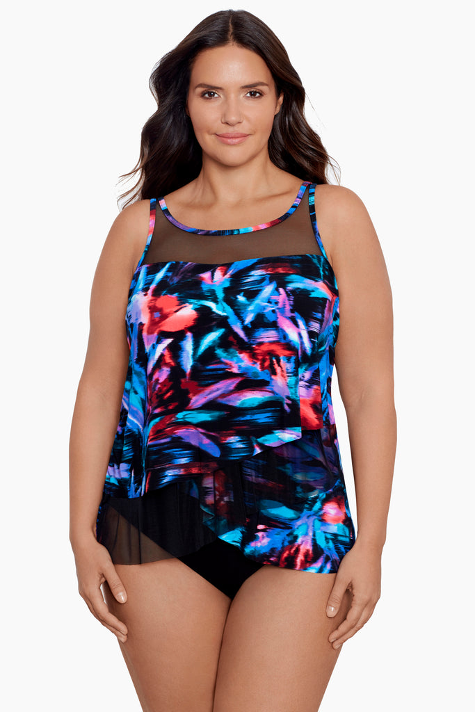Young woman wearing a miracle tankini swim suit