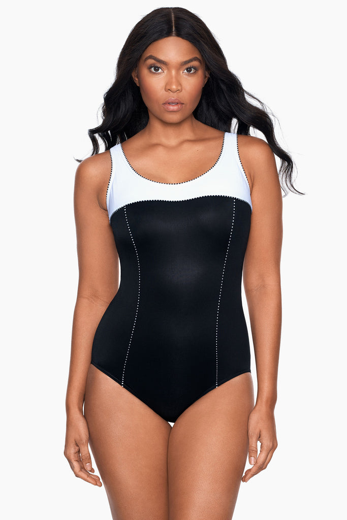 Girl in a slimming one piece swim suit.